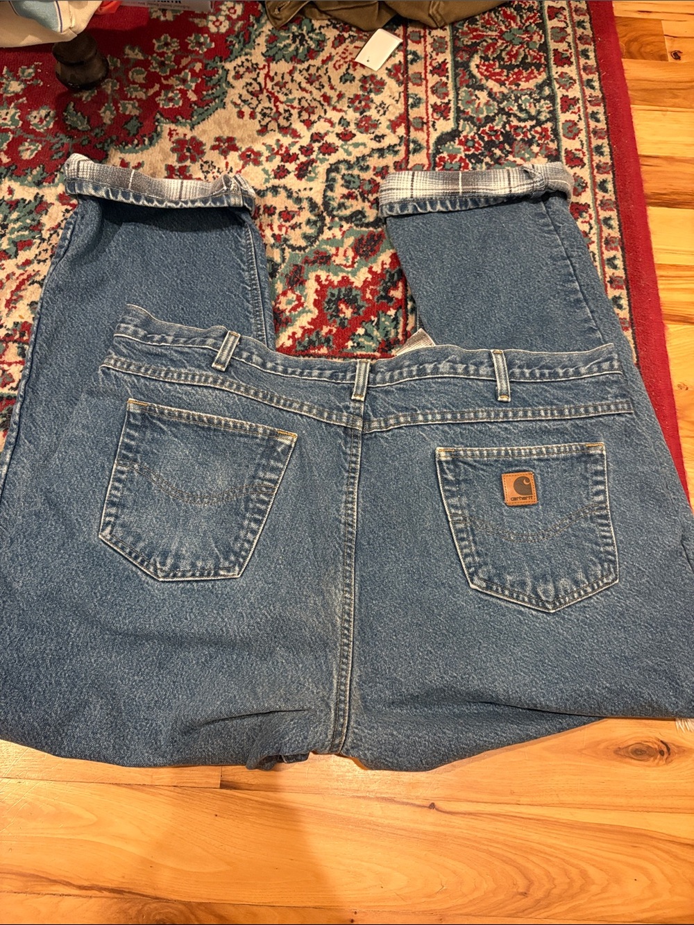 Carhartt Classic Blue Denim Work Jeans with flannel lining